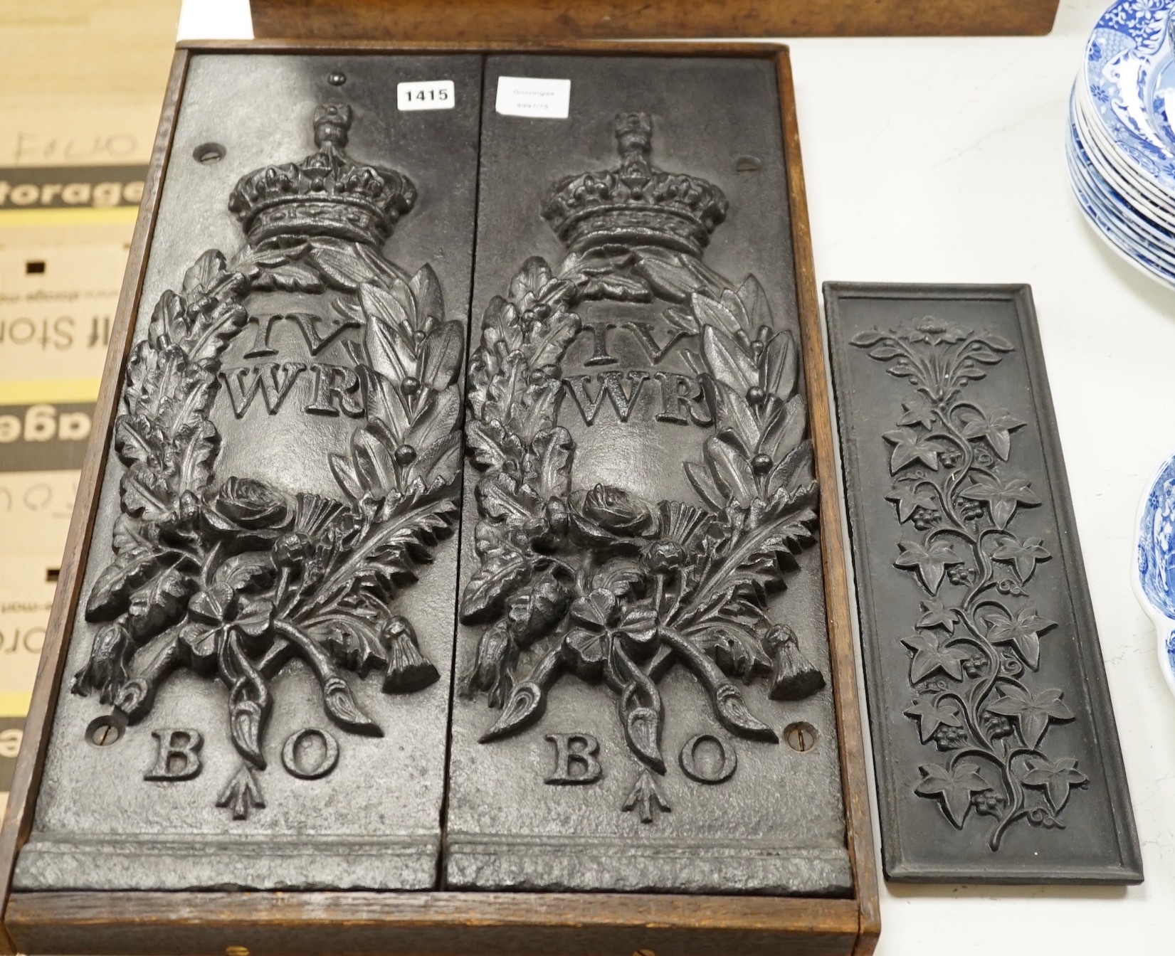 A pair of William IV Board of Ordinance cast iron framed plaques and a smaller plaque, each 54cms high x 17cms wide